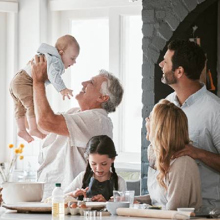 Multigenerational family in kitchen | The State Pension