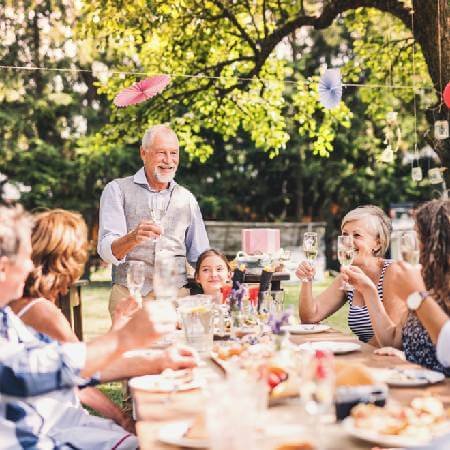 Family and friends enjoying an outside meal